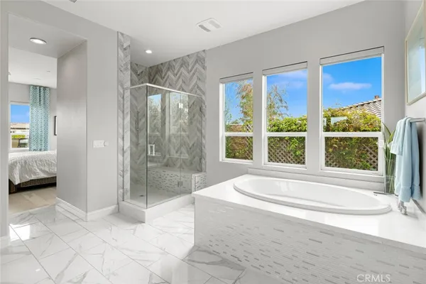 a utility room with sink dryer and washer
