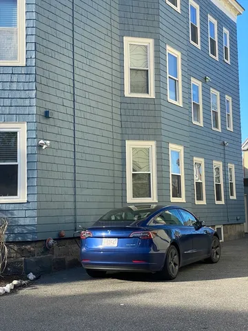 a view of a room with wooden floor and staircase