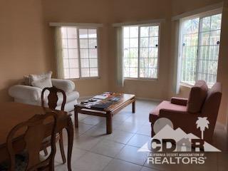 66071 Santa Rosa Road Desert Hot Springs, CA 92240 - Photo 12 of 15 a reading room with furniture and two windows
