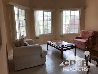 66071 Santa Rosa Road Desert Hot Springs, CA 92240 - Photo 13 of 15 a living room with furniture and a window