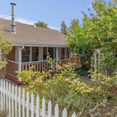 a house view with a garden space