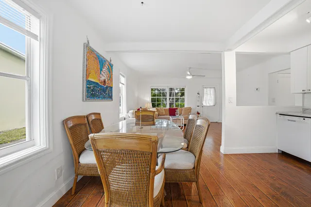 a bedroom with furniture and wooden floor