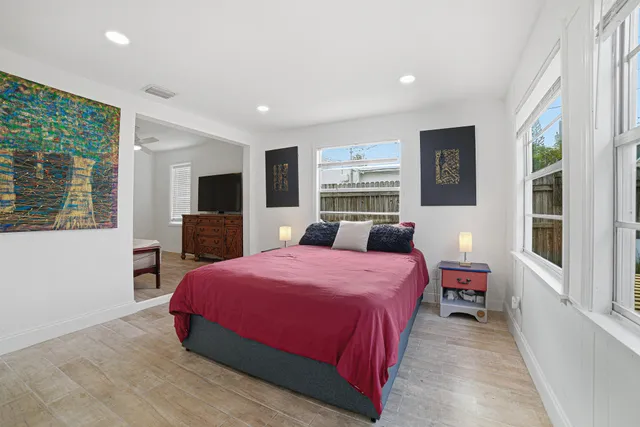 a bathroom with a toilet sink and shower