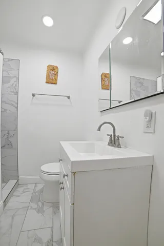 a outdoor space with patio the couches and a dining table with a garden view