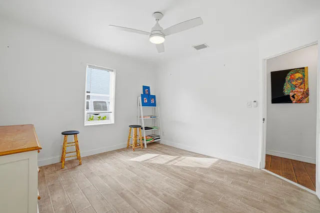 a bathroom with a granite countertop shower