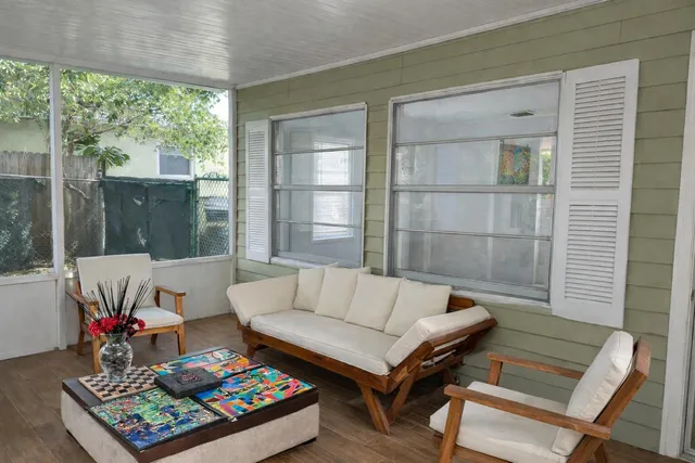 an aerial view of a house with a garden