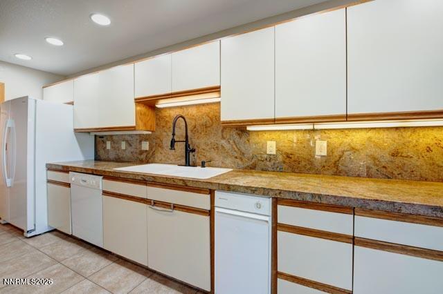 2640 Rockview Drive Reno, NV 89519 - Photo 25 of 56 a kitchen with stainless steel appliances granite countertop a sink and a stove