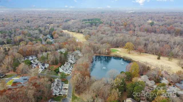 an aerial view of a houses with outdoor space