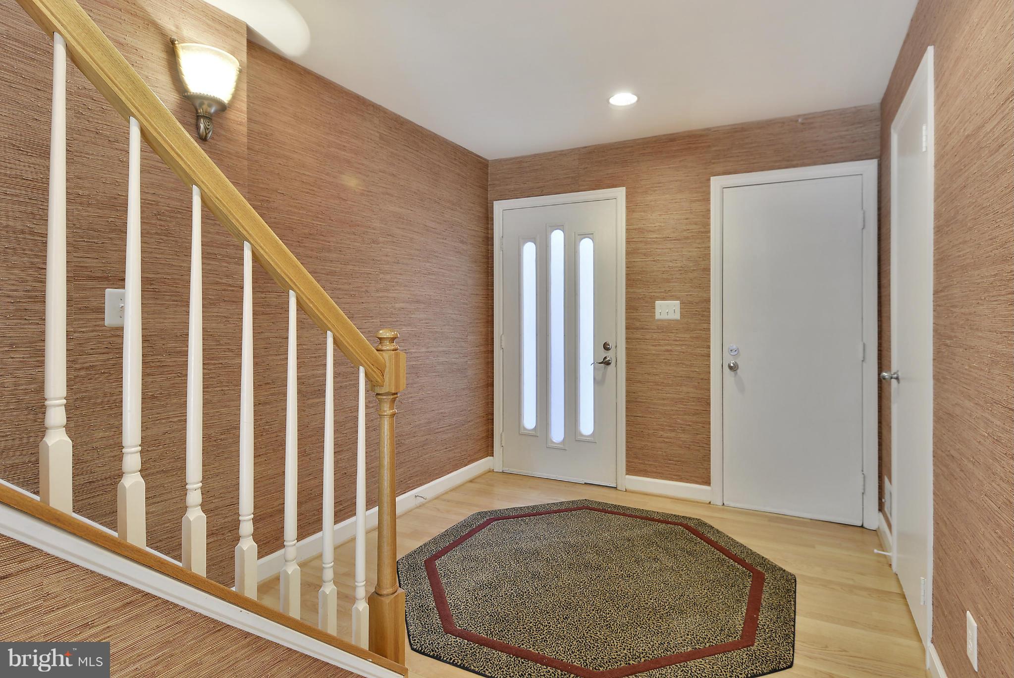 1935 Lakeport Way Reston, VA 20191 - Photo 2 of 30 Foyer Entrance with Designer Grass Cloth