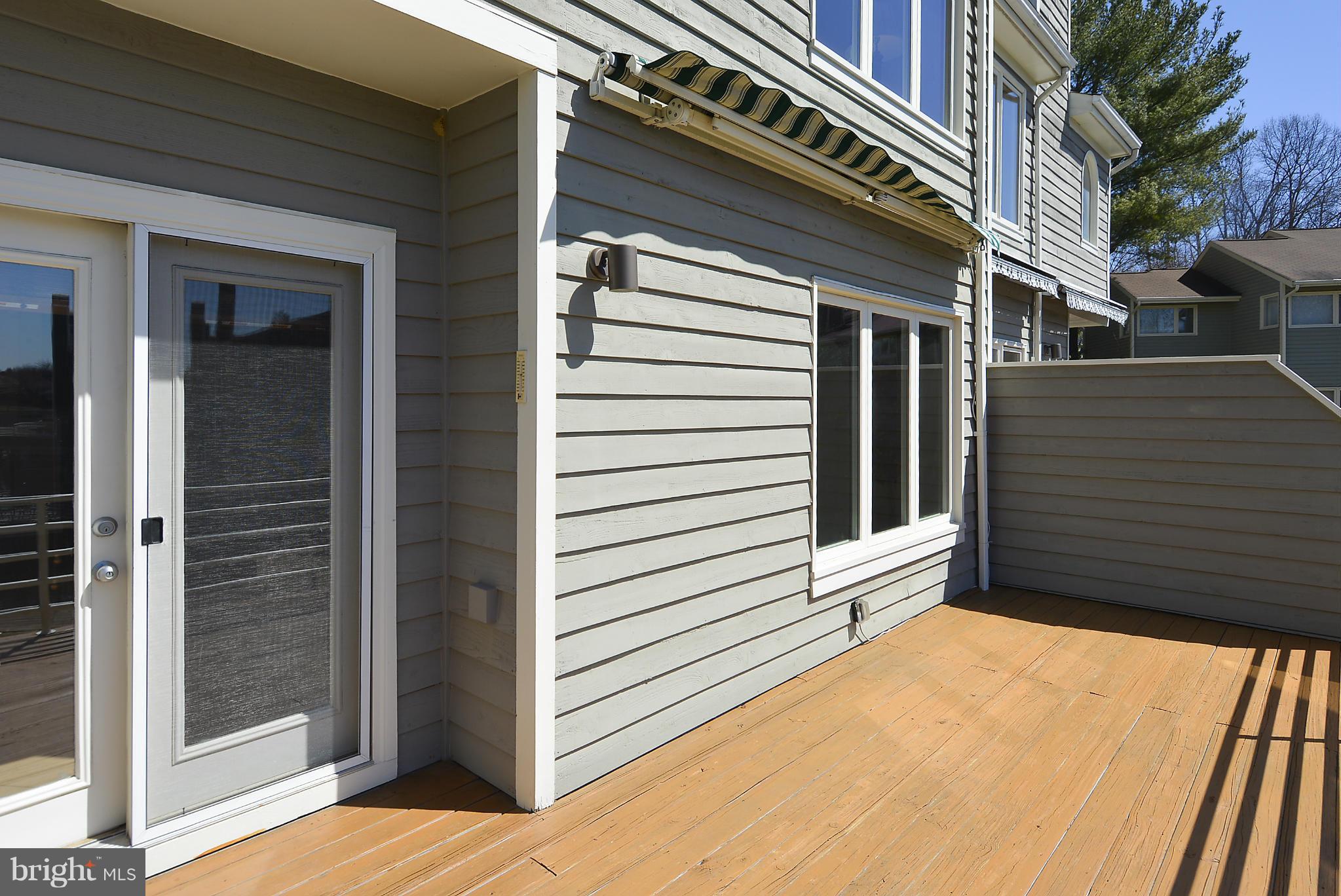 1935 Lakeport Way Reston, VA 20191 - Photo 6 of 30 Deck off Living Rm w/Sunsetter Awning