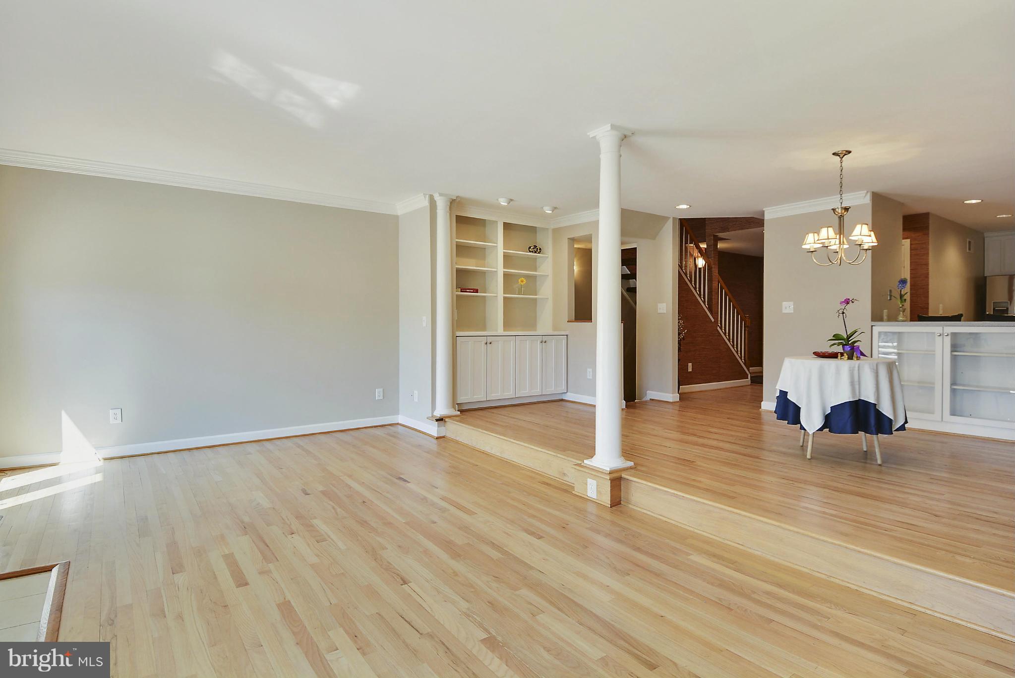 1935 Lakeport Way Reston, VA 20191 - Photo 7 of 30 Crown Moldings in Living/Dining Areas
