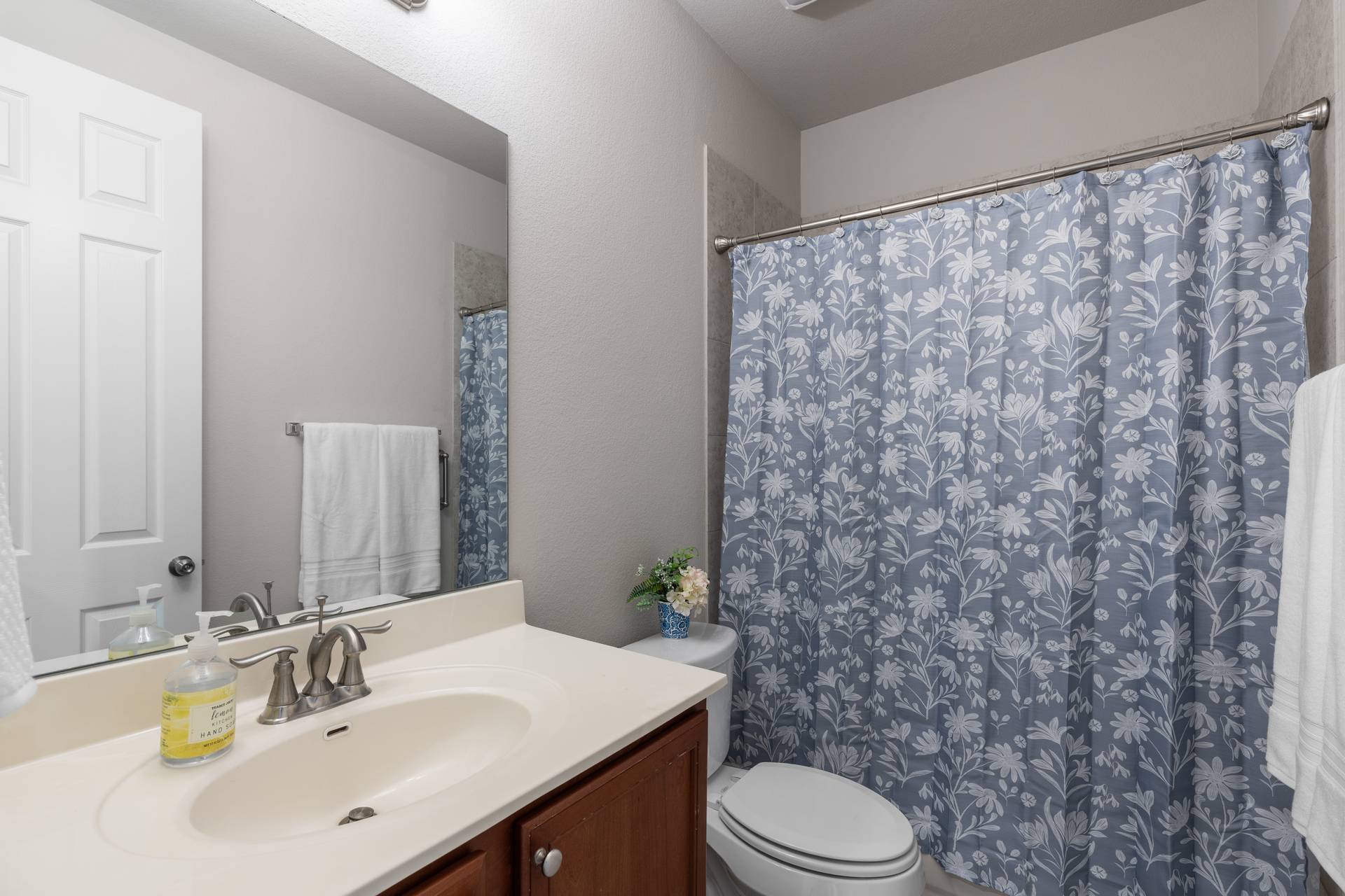 3516 Venezia View Leander, TX 78641 - Photo 19 of 40 Bathroom featuring vanity and a shower with shower curtain