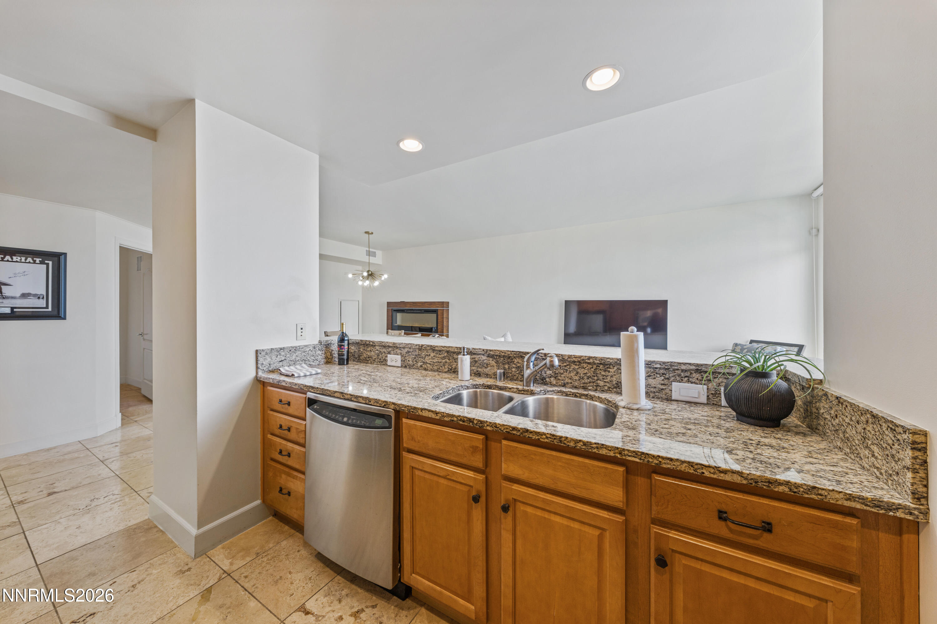 50 North Sierra Street, Unit 903 Reno, NV 89501 - Photo 17 of 61 a kitchen with cabinets and sink