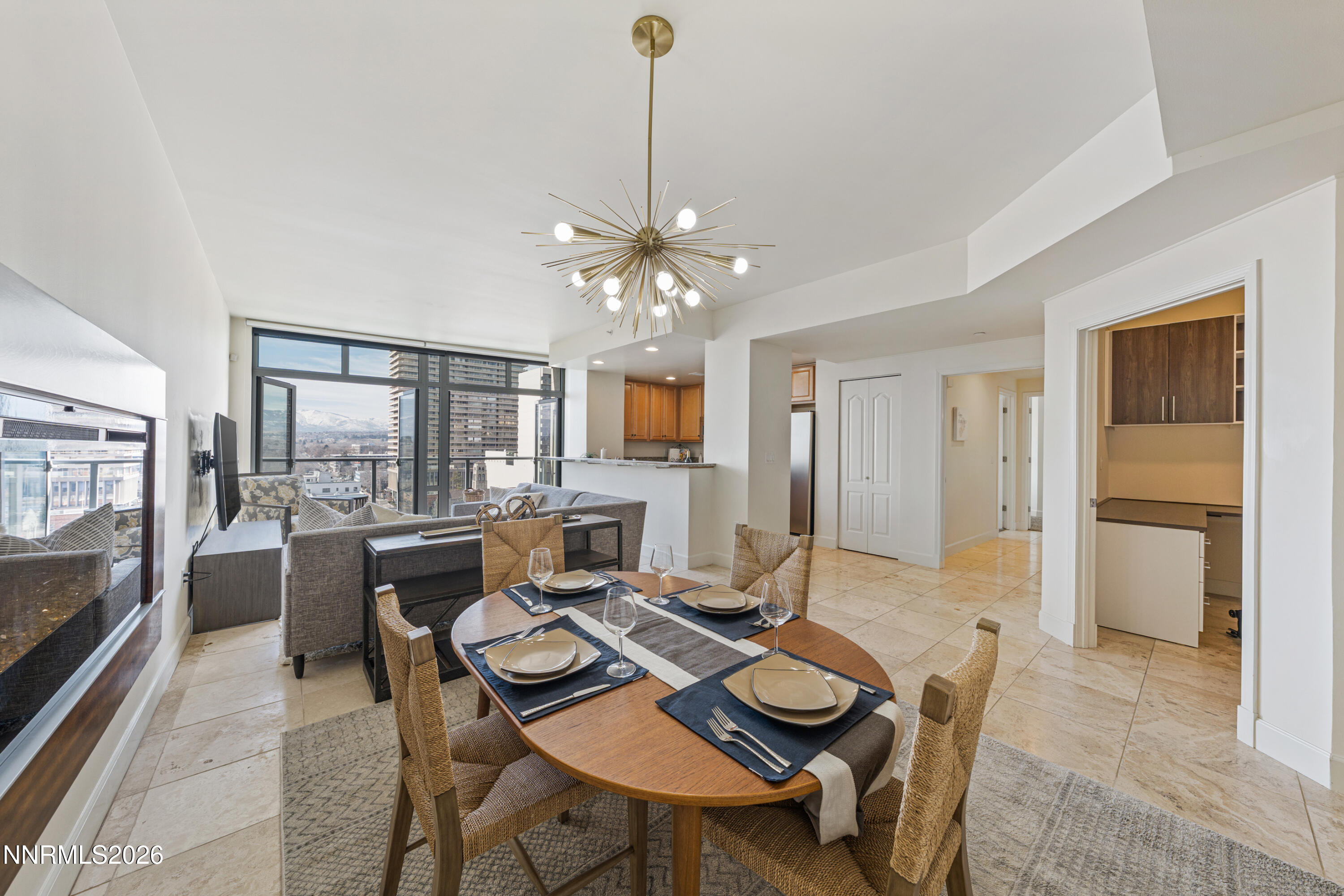 50 North Sierra Street, Unit 903 Reno, NV 89501 - Photo 2 of 61 a view of a dining room with furniture window and wooden floor