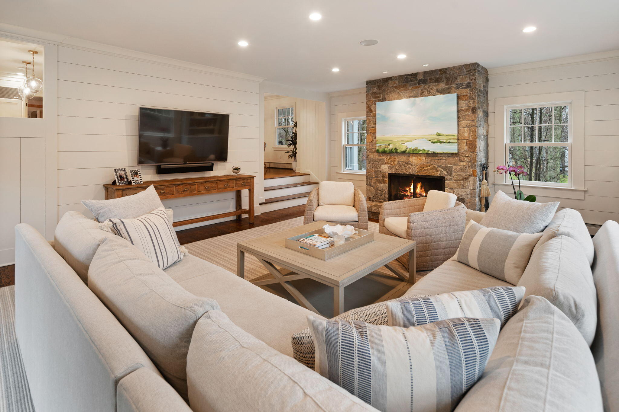 4 Green Beech Drive Rowayton, CT 06853 - Photo 11 of 39 a living room with furniture and a flat screen tv