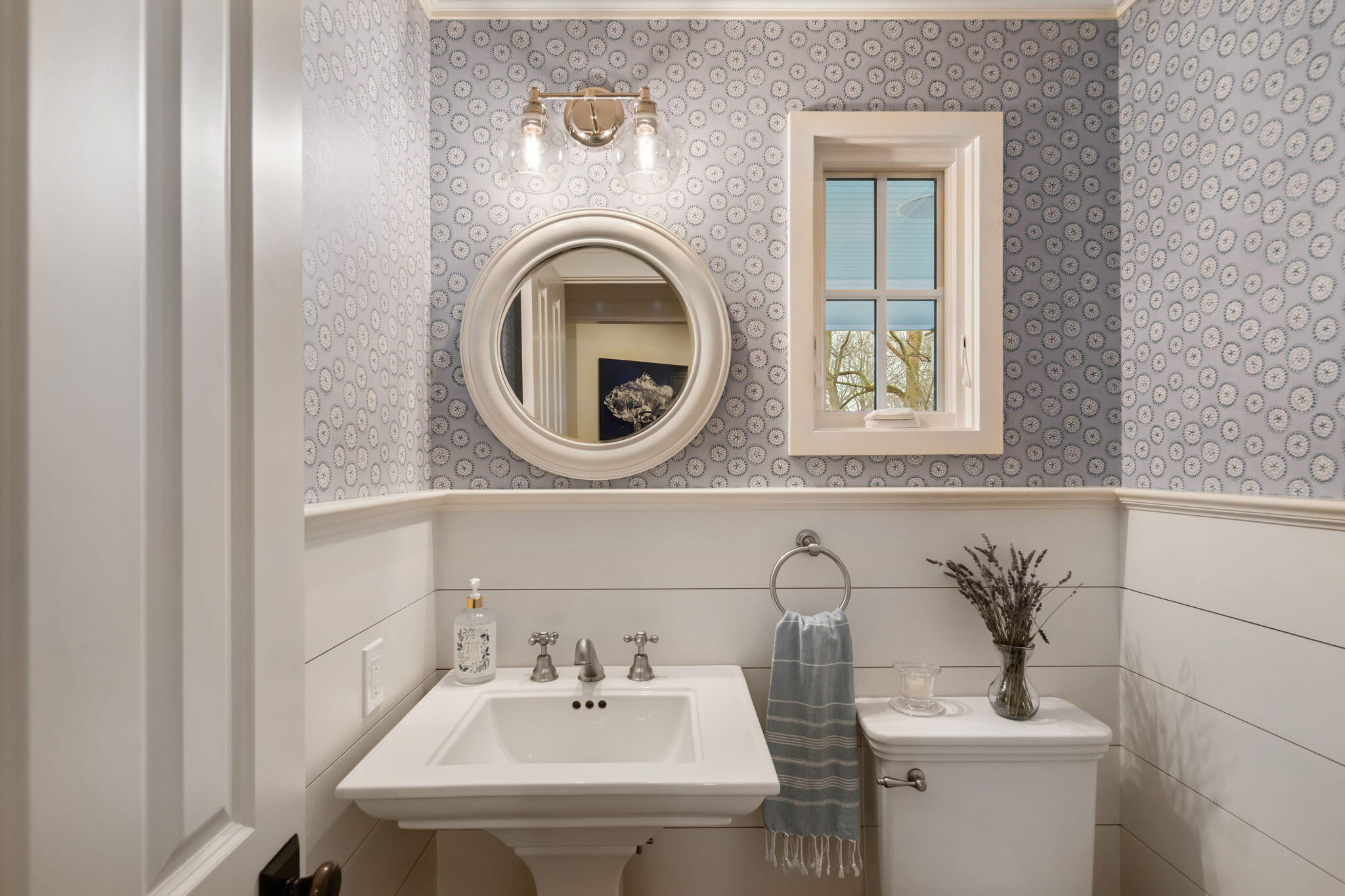 4 Green Beech Drive Rowayton, CT 06853 - Photo 18 of 39 a bathroom with a sink and a mirror