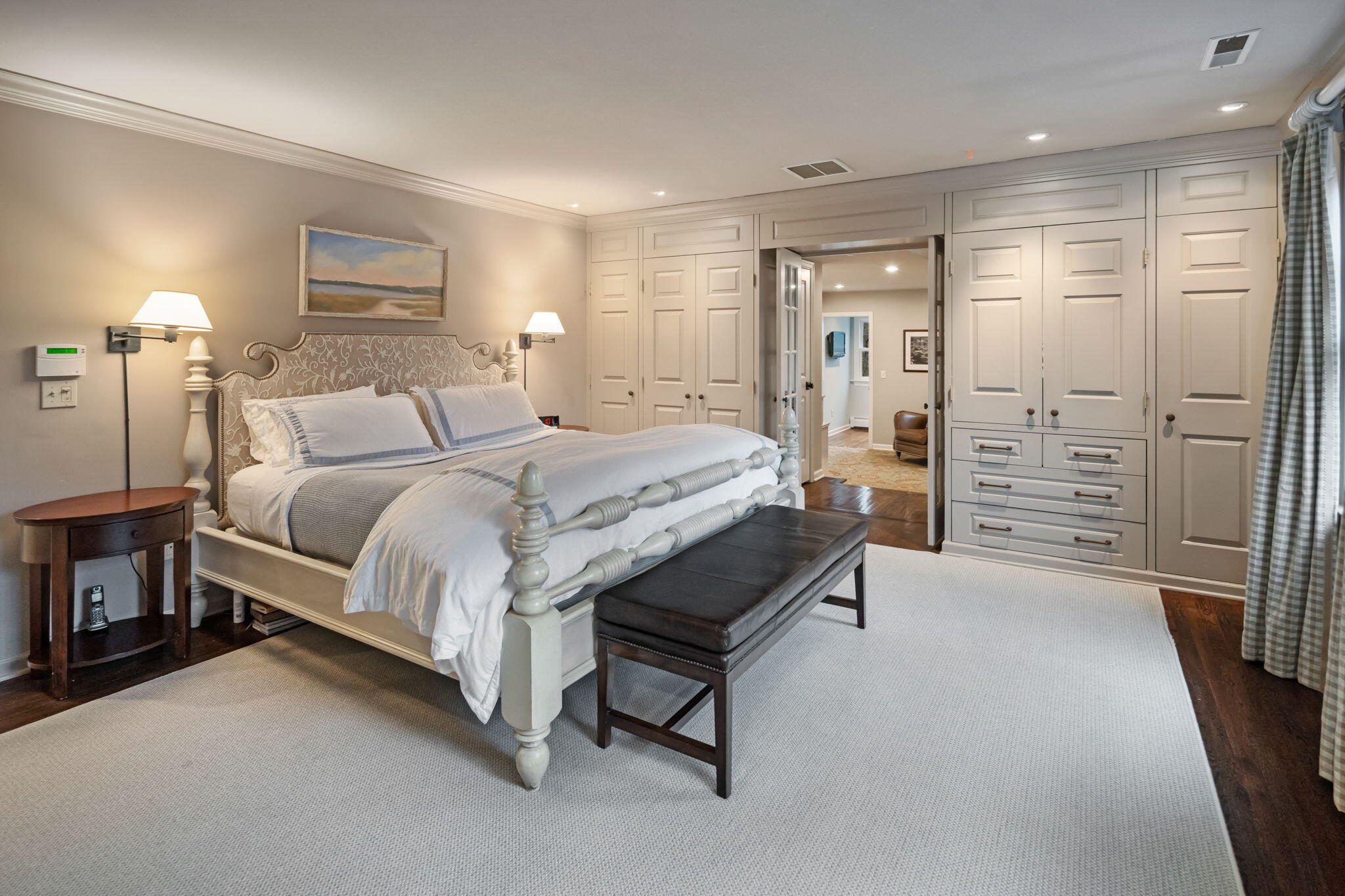 4 Green Beech Drive Rowayton, CT 06853 - Photo 19 of 39 a spacious bedroom with a bed and a cabinets