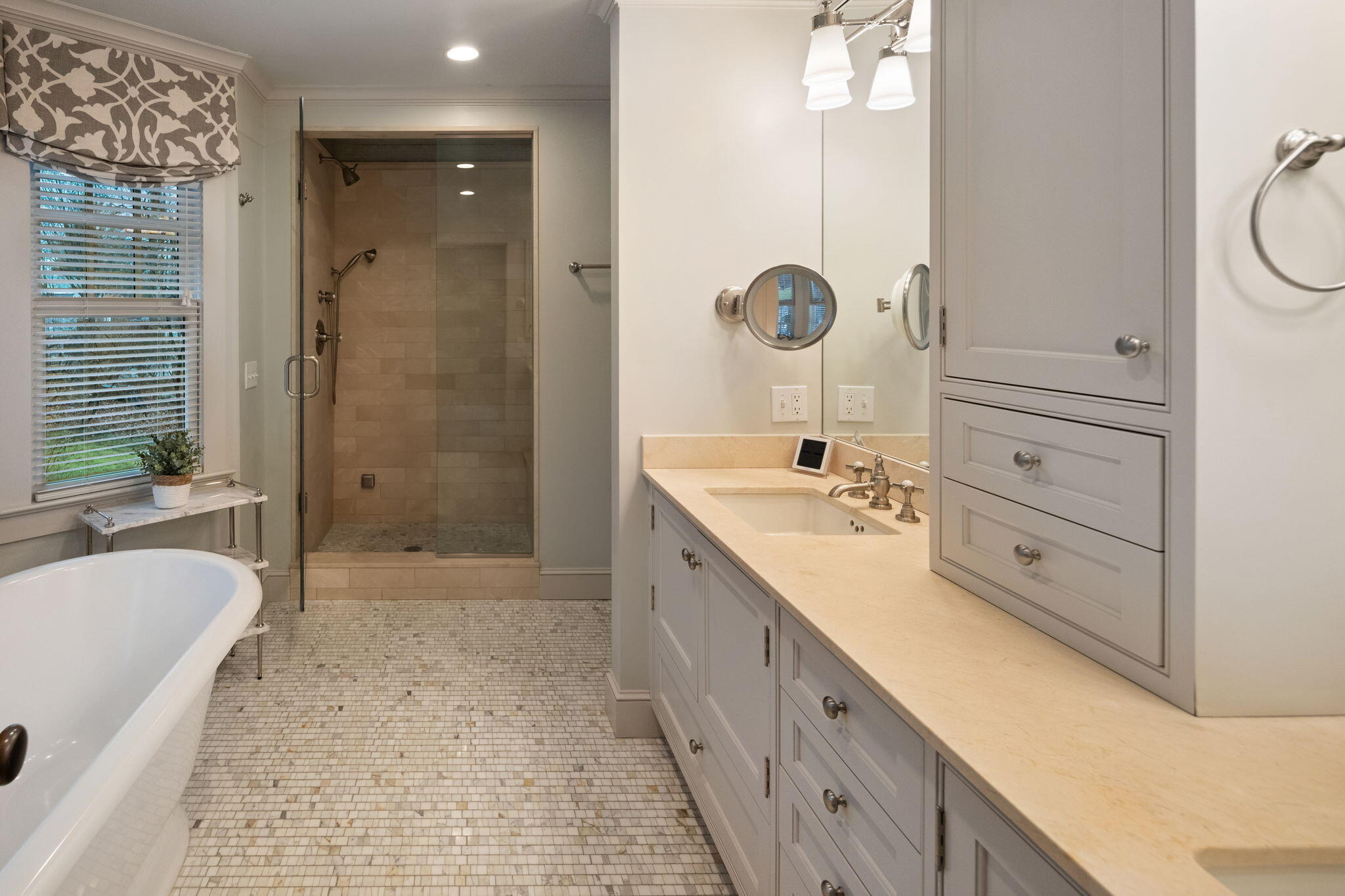4 Green Beech Drive Rowayton, CT 06853 - Photo 21 of 39 a spacious bathroom with a double vanity sink a mirror and a bathtub