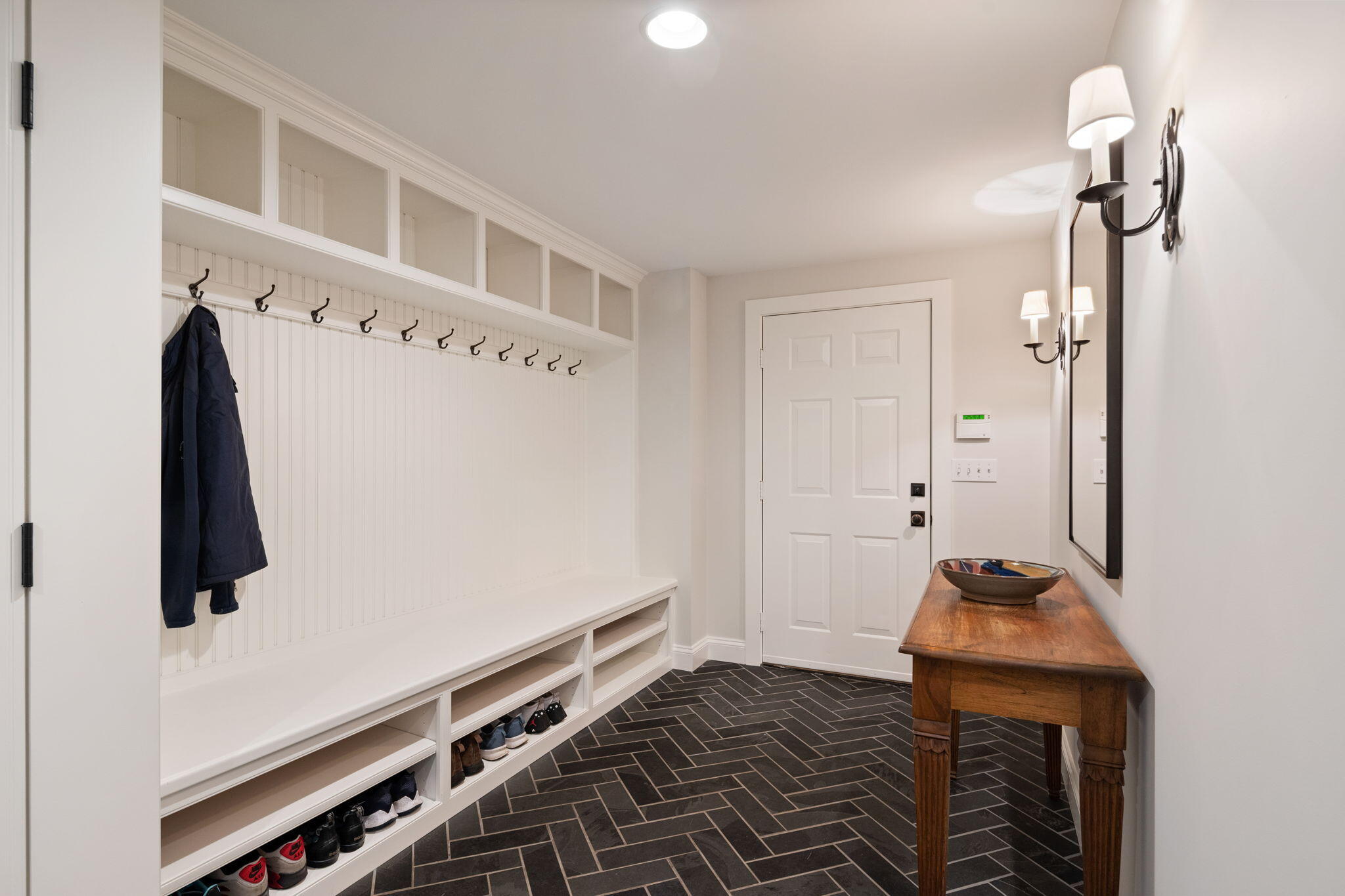 4 Green Beech Drive Rowayton, CT 06853 - Photo 32 of 39 a hallway with a white stove top oven and a refrigerator