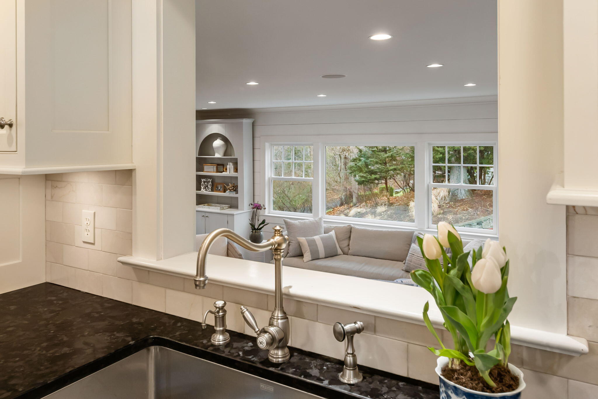 4 Green Beech Drive Rowayton, CT 06853 - Photo 7 of 39 a kitchen with a sink and a potted plant