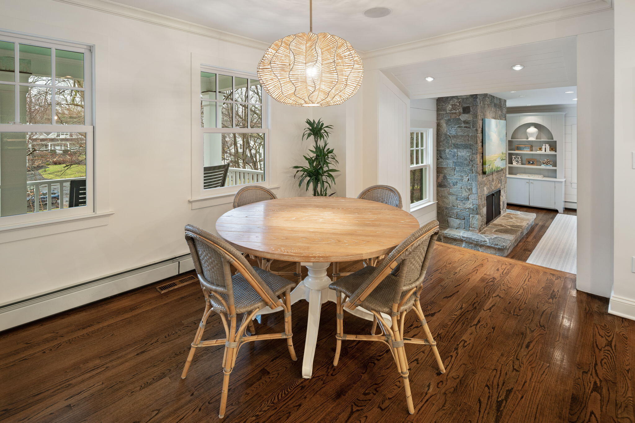 4 Green Beech Drive Rowayton, CT 06853 - Photo 8 of 39 a view of a dining room with furniture wooden floor and chandelier