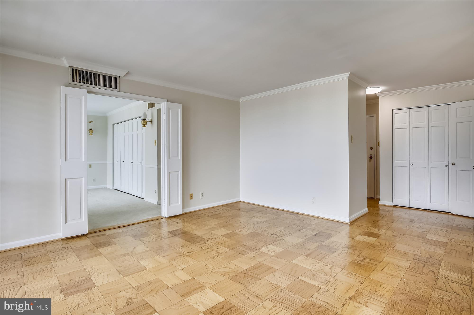 6800 Fleetwood Road, Unit 1004 McLean, VA 22101 - Photo 12 of 40 Spacious, light-filled living area awaits you.