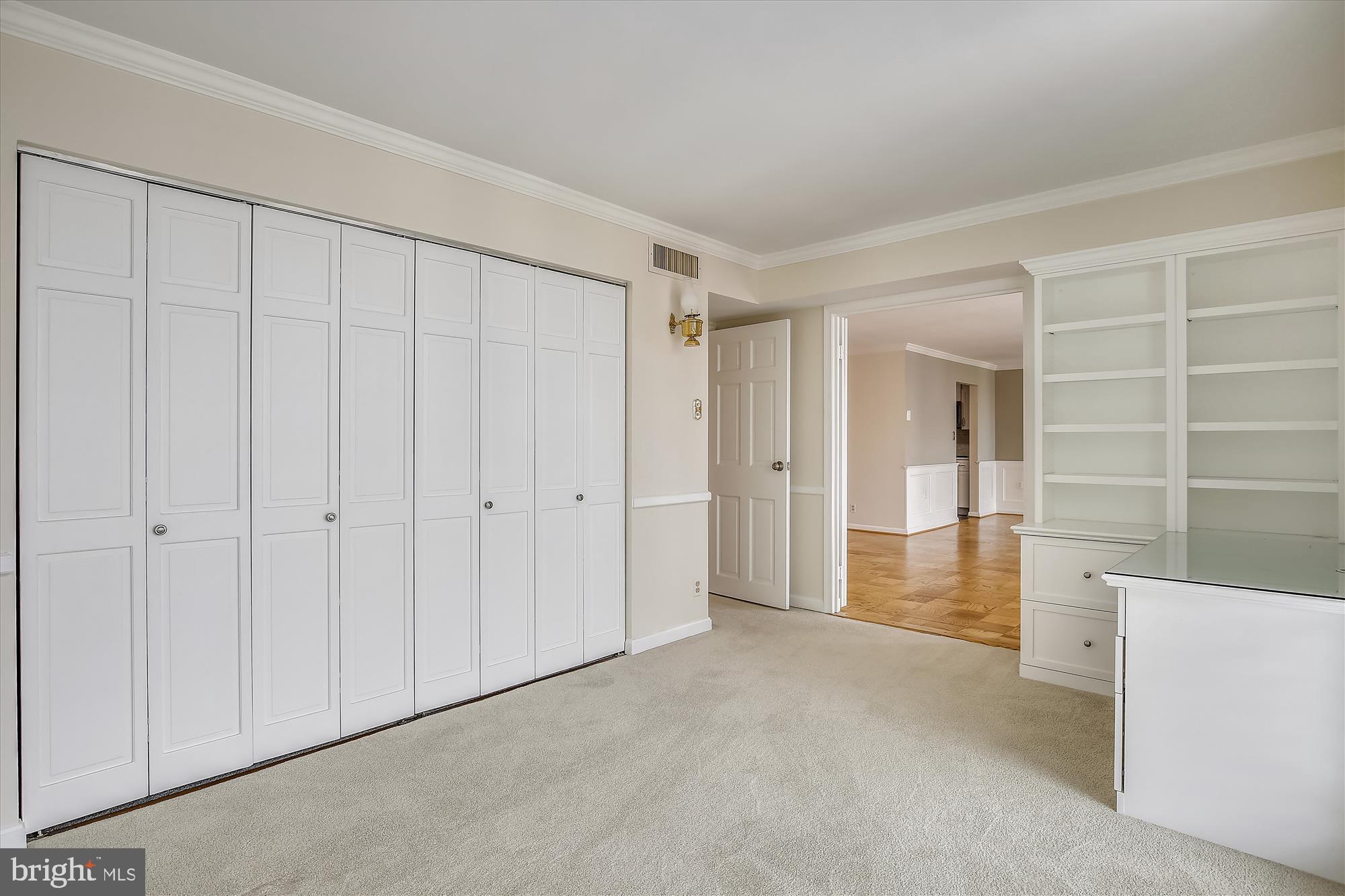 6800 Fleetwood Road, Unit 1004 McLean, VA 22101 - Photo 13 of 40 Spacious room with elegant built-in storage.