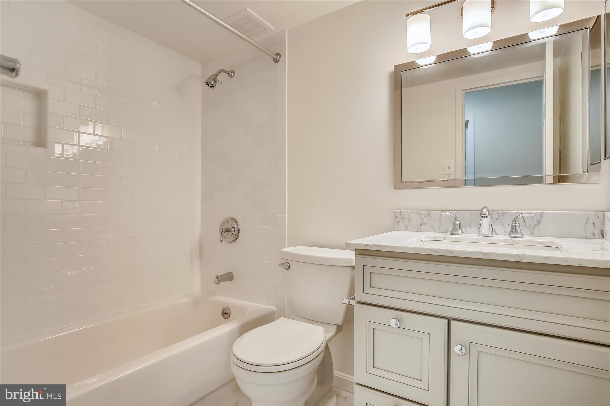 6800 Fleetwood Road, Unit 1004 McLean, VA 22101 - Photo 18 of 40 Modern bathroom with sleek finishes.