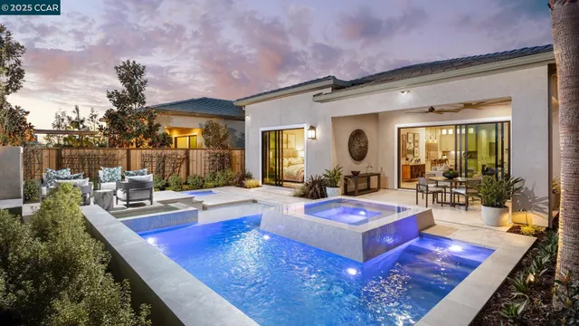a view of a living room and dining room