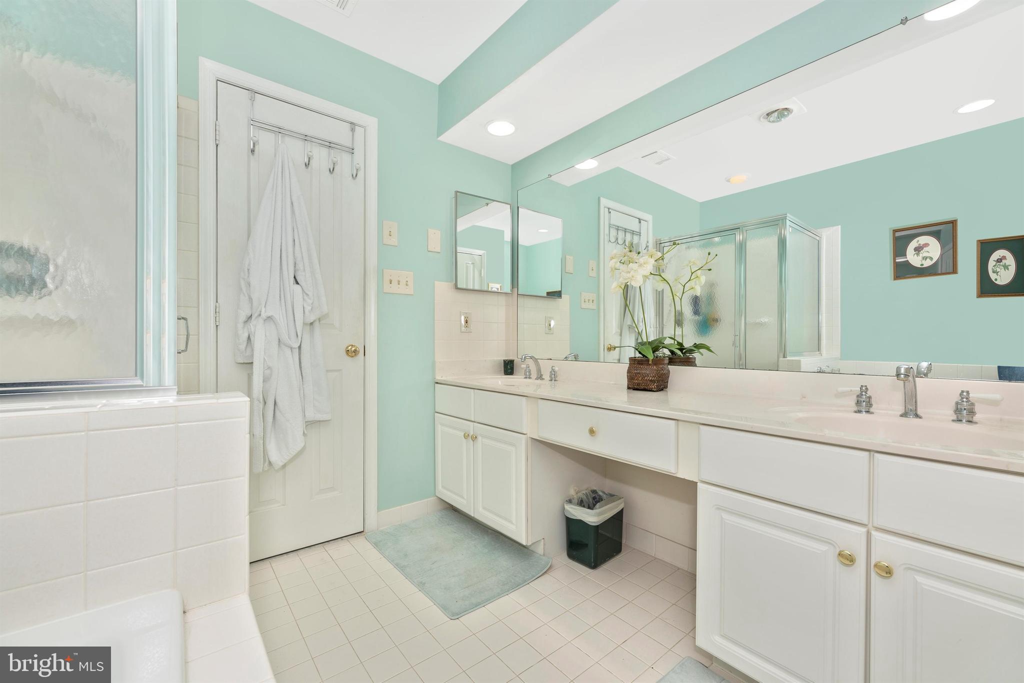 2389 Bear Den Road Frederick, MD 21701 - Photo 19 of 47 Double sinks and white cabinets.