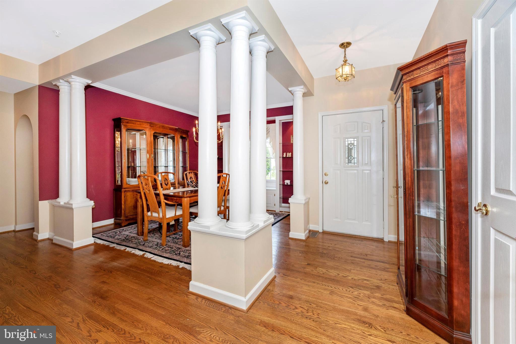 2389 Bear Den Road Frederick, MD 21701 - Photo 3 of 47 Hardwood flooring and graceful columns greet you.