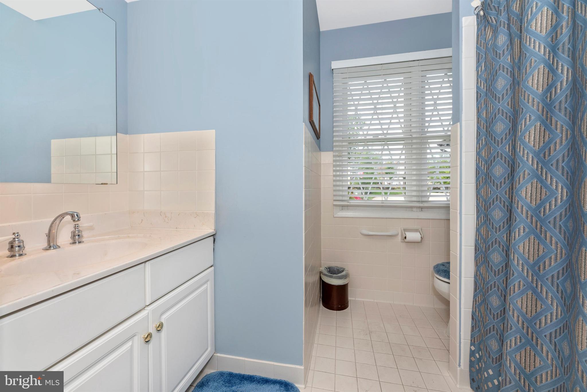 2389 Bear Den Road Frederick, MD 21701 - Photo 23 of 47 Hall bath has tile flooring.