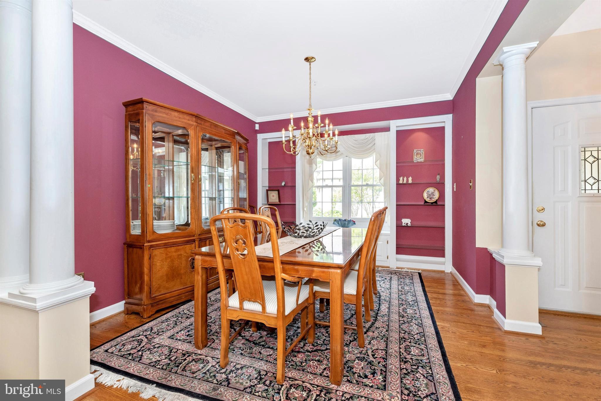 2389 Bear Den Road Frederick, MD 21701 - Photo 4 of 47 Dining room has built-in shelves and seat storage.