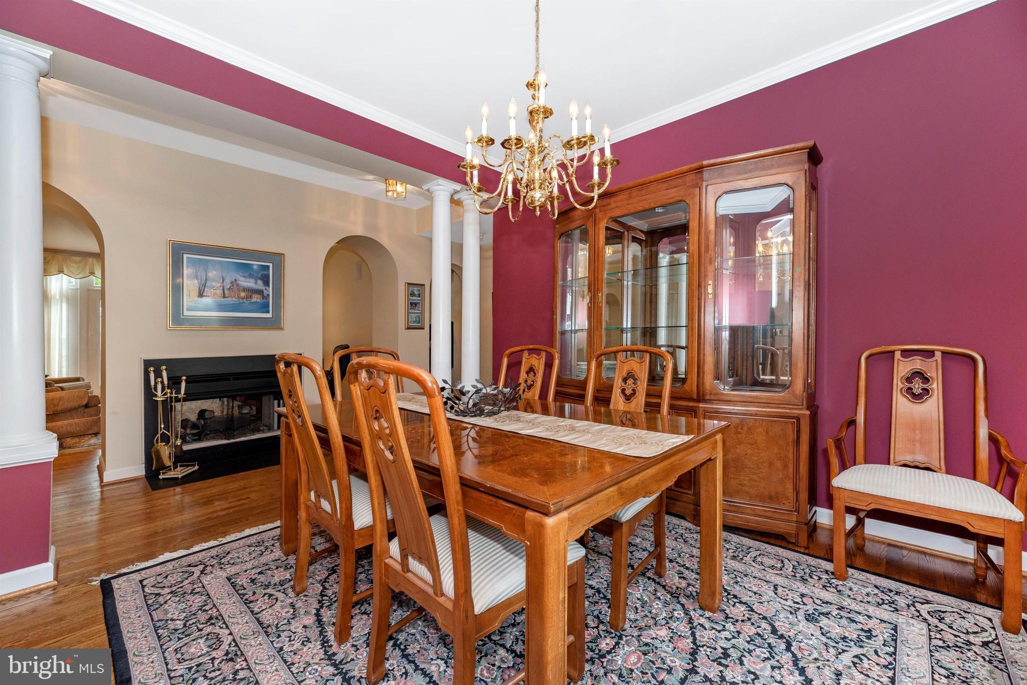 2389 Bear Den Road Frederick, MD 21701 - Photo 6 of 47 Double sided fireplace divides living, dining room