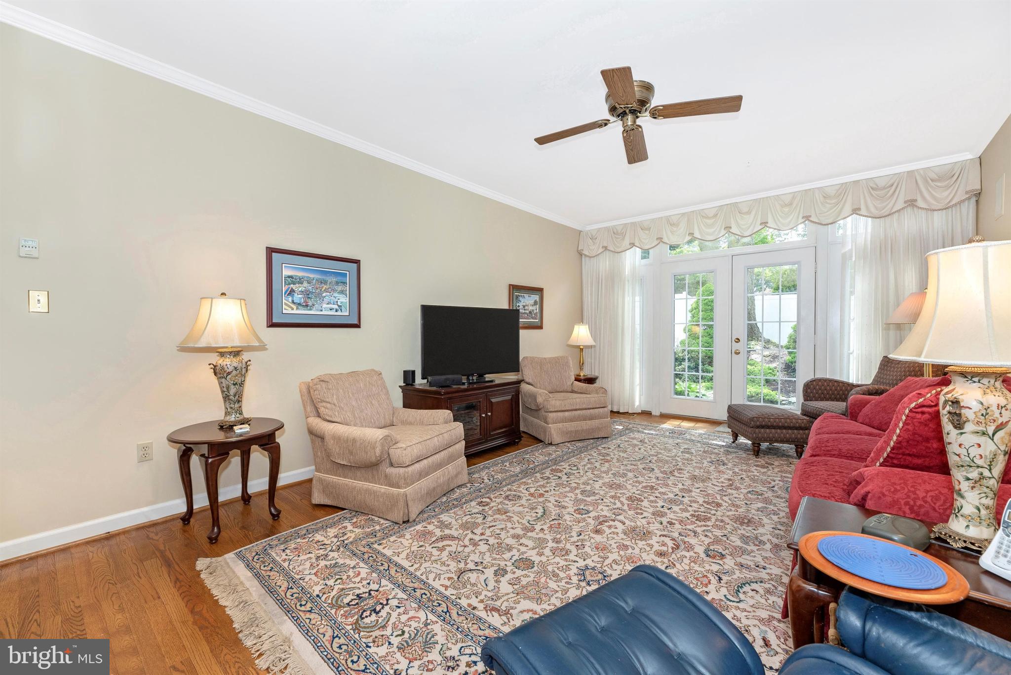 2389 Bear Den Road Frederick, MD 21701 - Photo 8 of 47 Hardwood flooring and french door to patio.