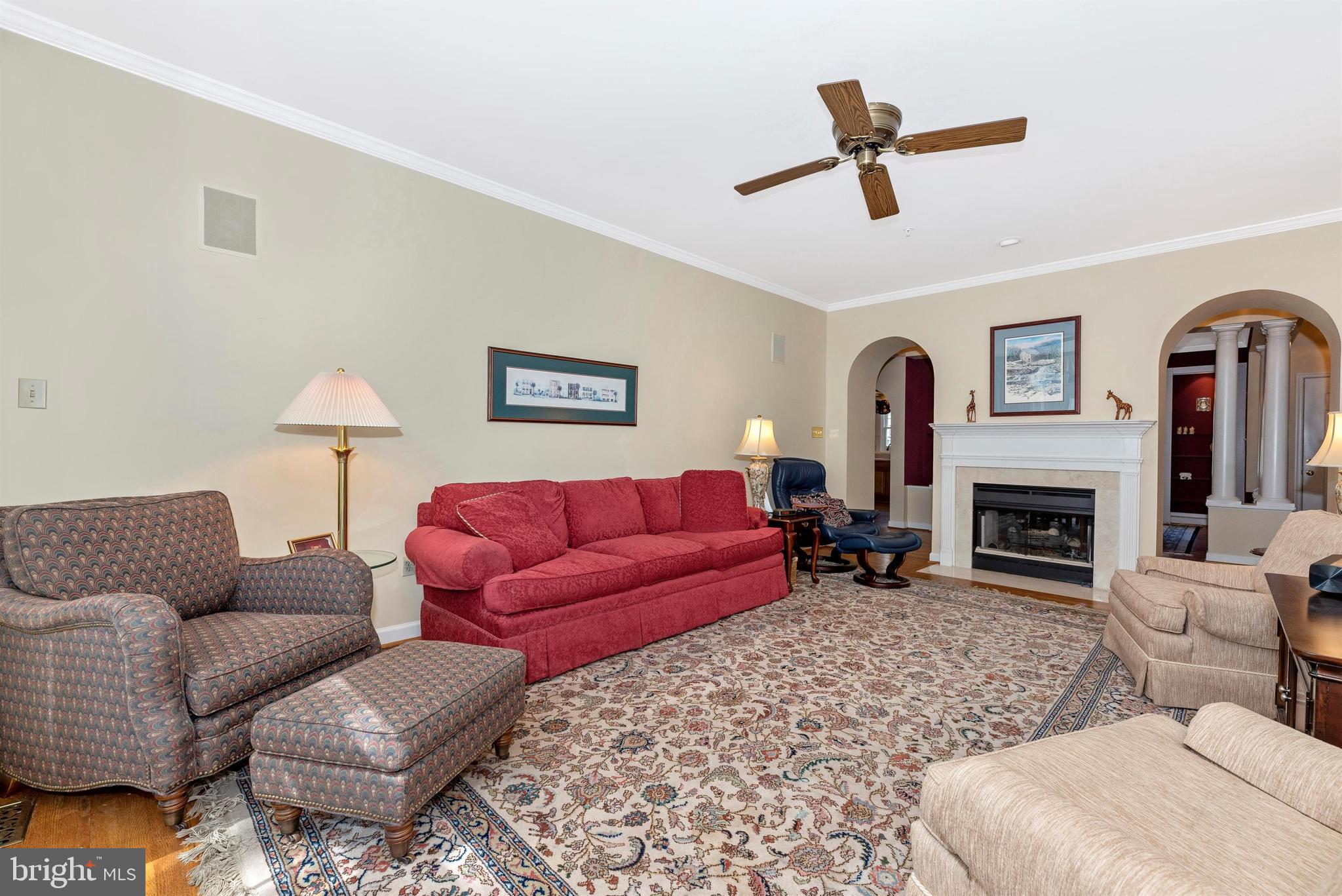 2389 Bear Den Road Frederick, MD 21701 - Photo 9 of 47 Double fireplace has beautiful wood mantel.