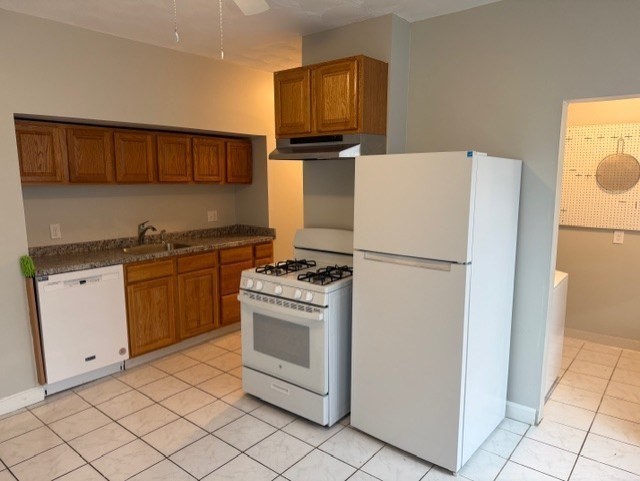 21 Sylvan Street, Unit 1 Worcester, MA 01603 - Photo 2 of 10 a kitchen with a refrigerator sink and stove