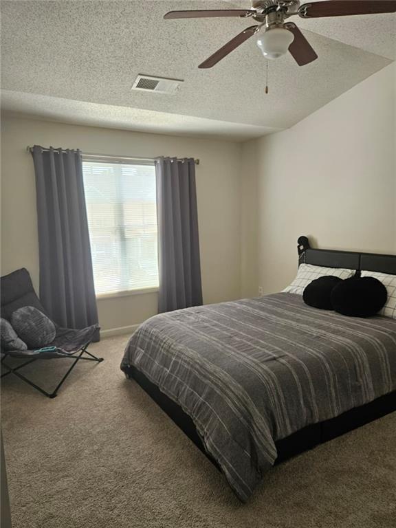 2238 Bigwood Trail Atlanta, GA 30349 - Photo 18 of 20 a bedroom with a bed and window