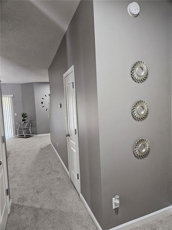2238 Bigwood Trail Atlanta, GA 30349 - Photo 10 of 20 a view of a hallway to a hallway