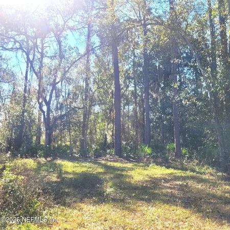 a view of swimming pool with an outdoor space and seating area