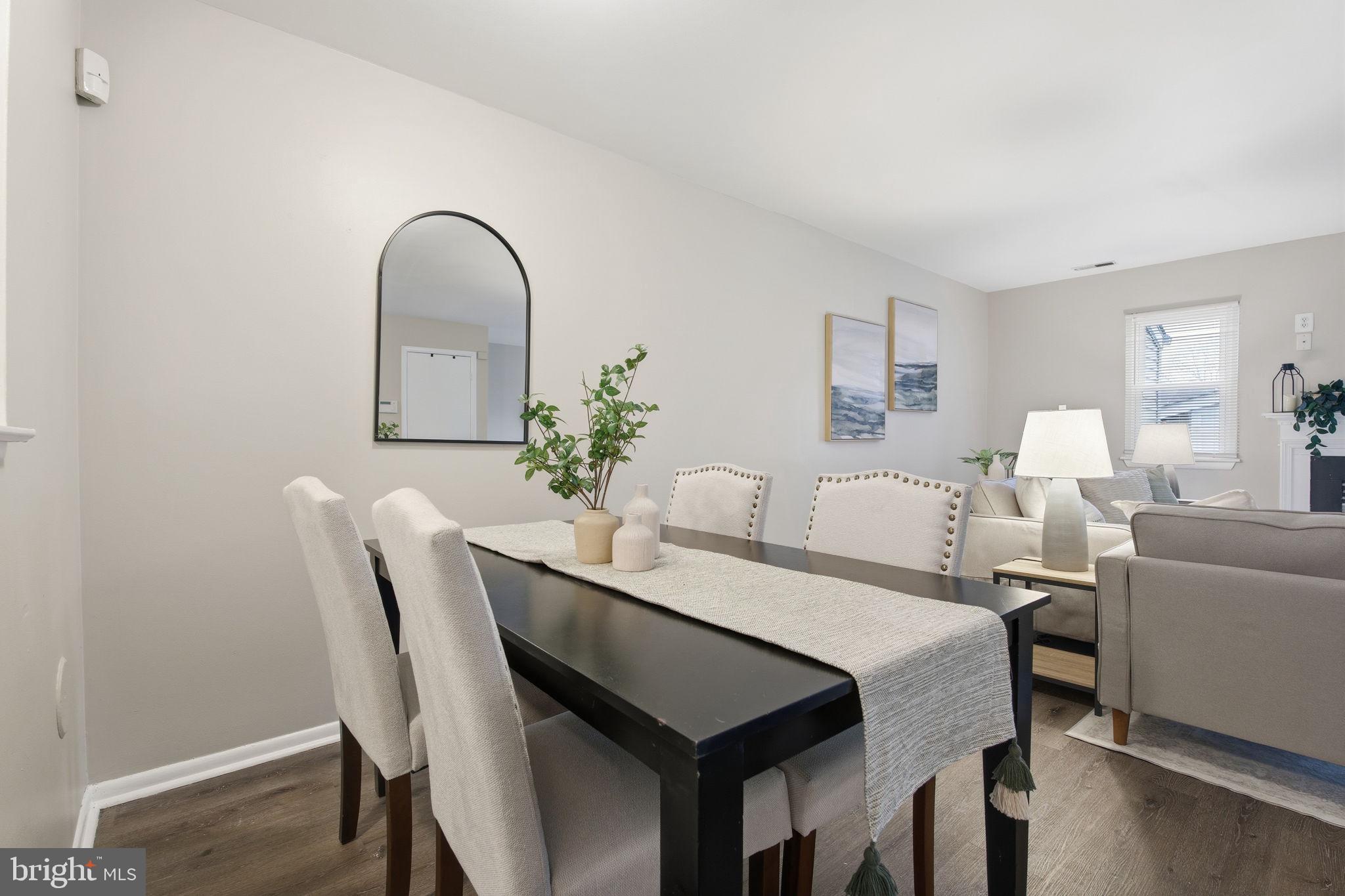 21 Ute Court Middle River, MD 21220 - Photo 11 of 36 a dining room with furniture and wooden floor
