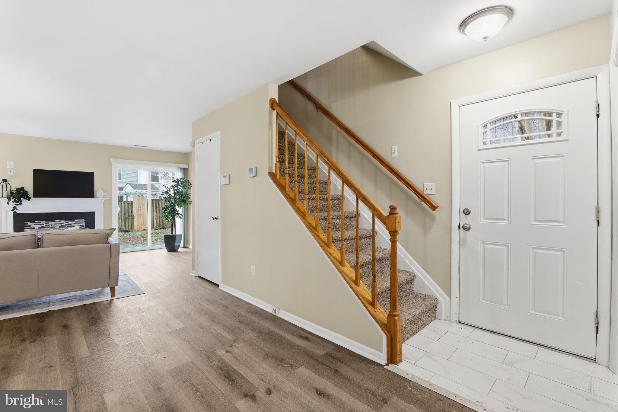 21 Ute Court Middle River, MD 21220 - Photo 15 of 36 a view of a livingroom with furniture stairs and a living room