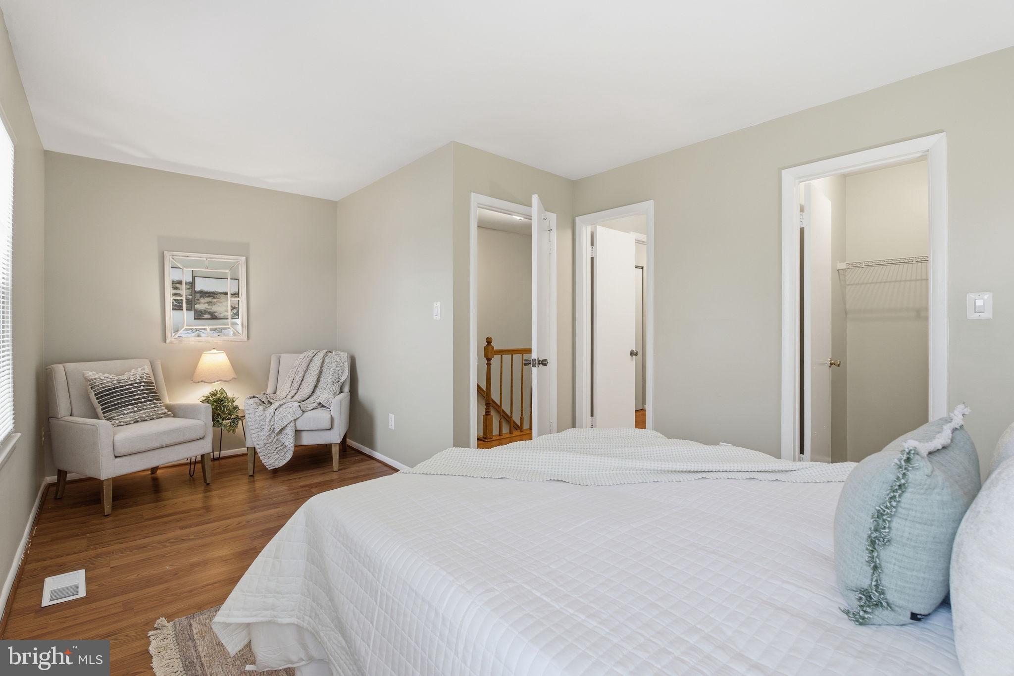 21 Ute Court Middle River, MD 21220 - Photo 23 of 36 a bedroom with a bed and a couch