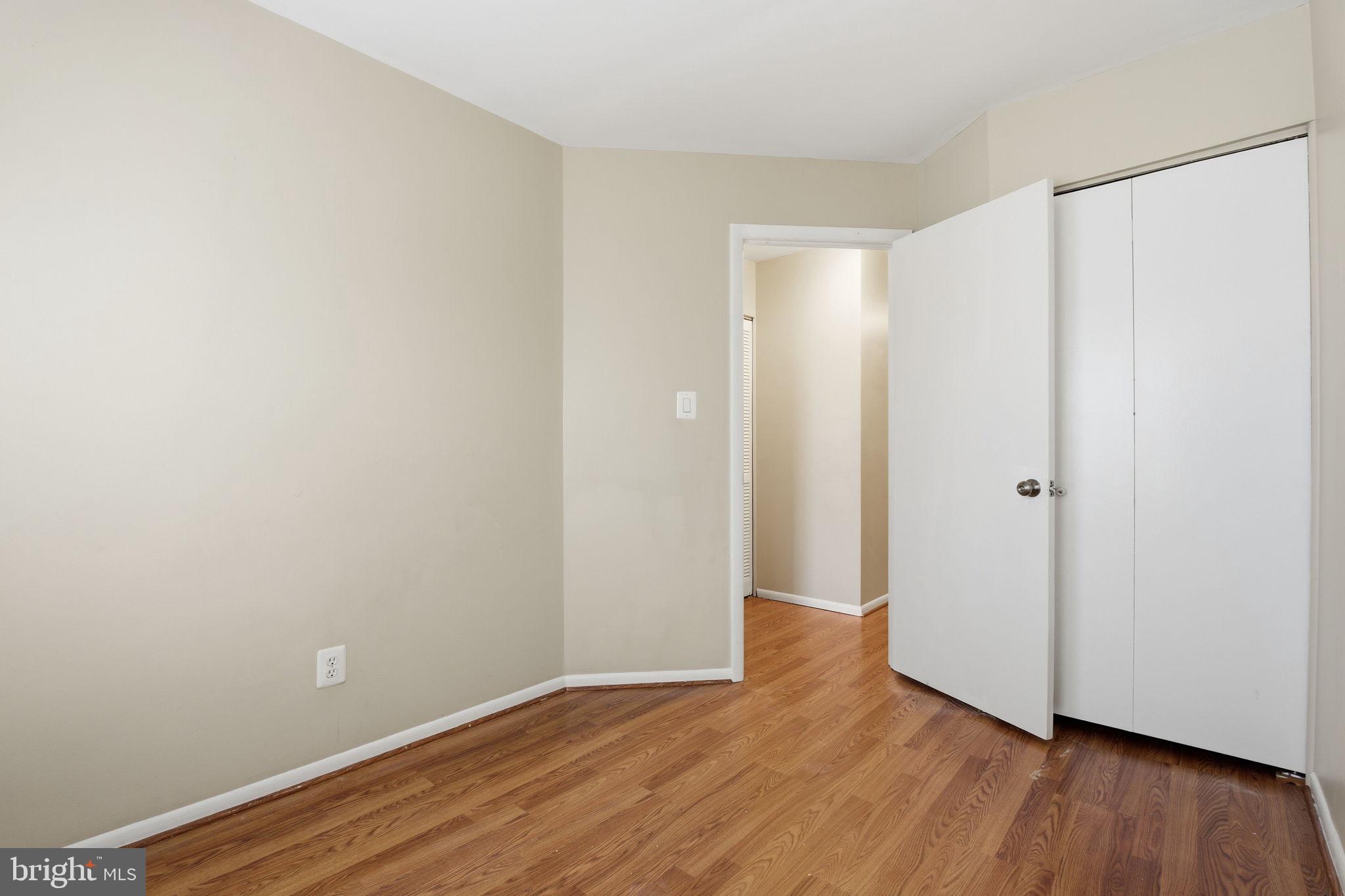 21 Ute Court Middle River, MD 21220 - Photo 26 of 36 a view of an empty room with wooden floor