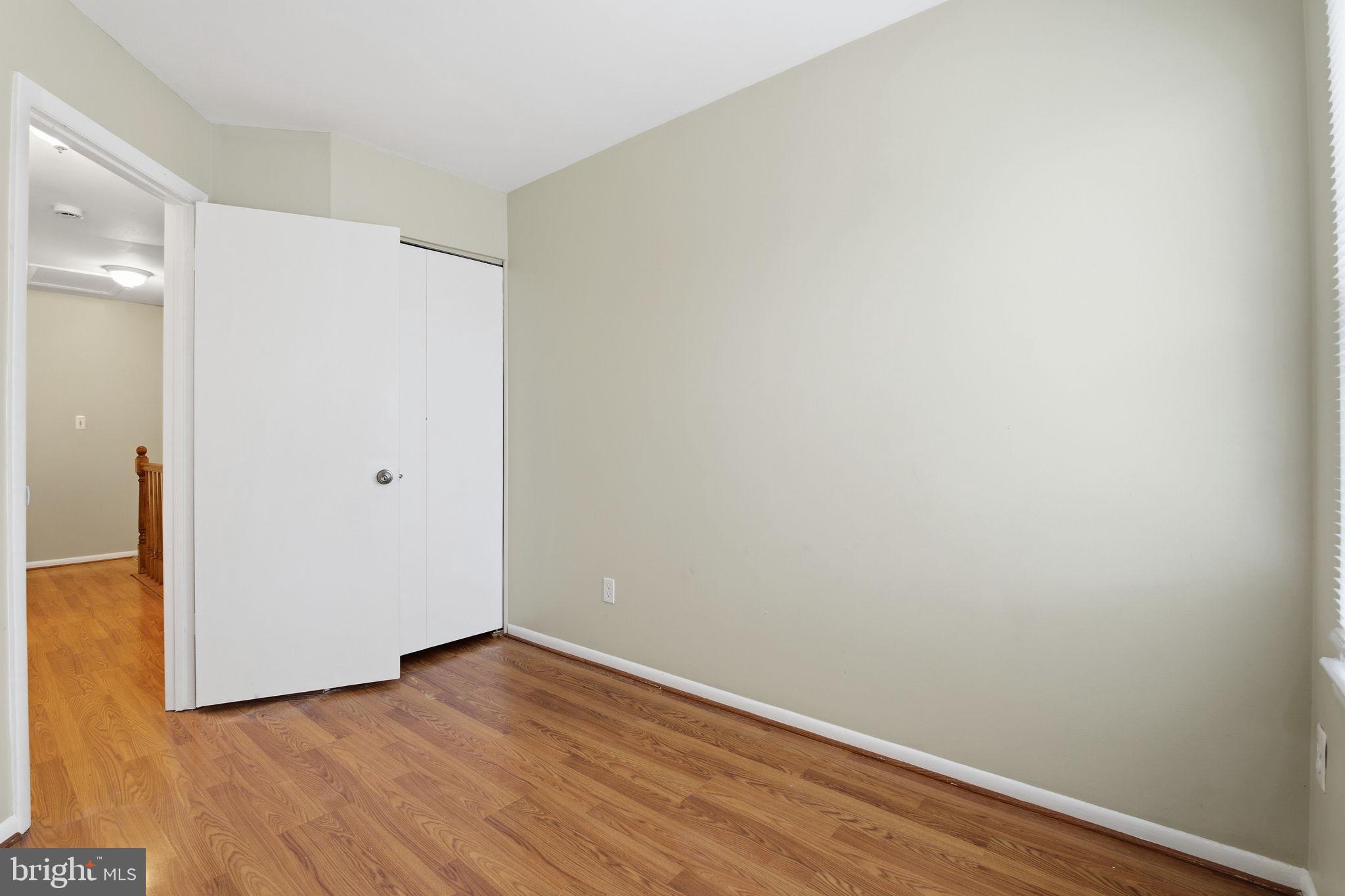 21 Ute Court Middle River, MD 21220 - Photo 27 of 36 a view of an empty room with wooden floor