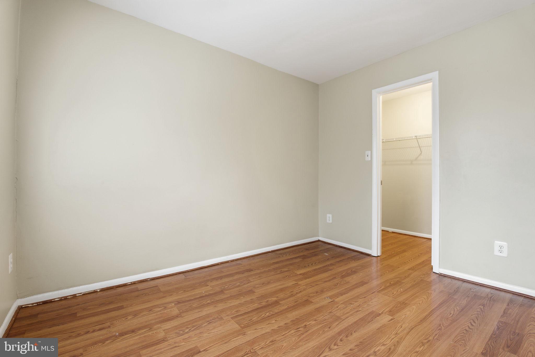 21 Ute Court Middle River, MD 21220 - Photo 31 of 36 a view of an empty room with wooden floor and a window