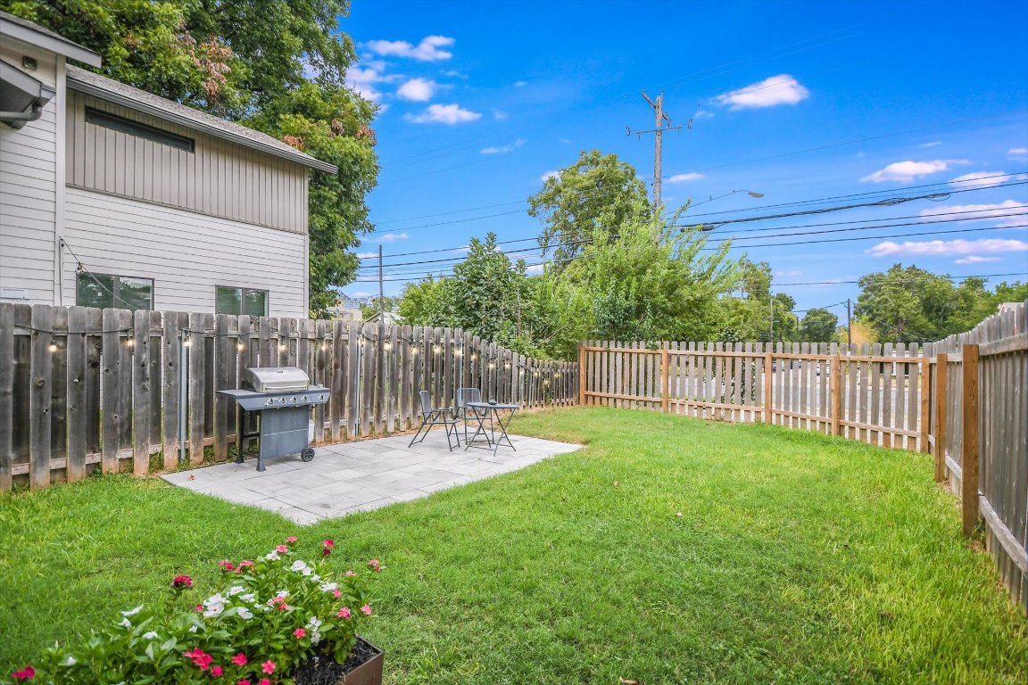 2414 East Martin Luther King Jr Boulevard, Unit A Austin, TX 78722 - Photo 11 of 32 a view of a chair and table of the house