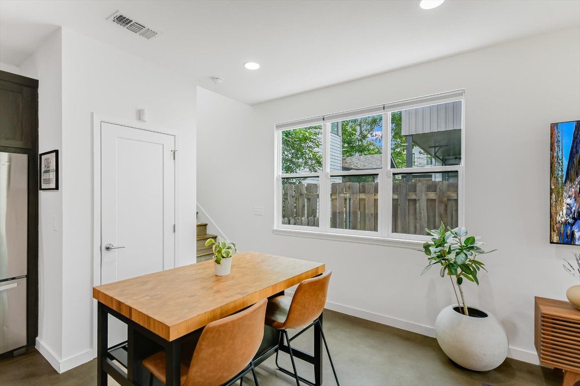 2414 East Martin Luther King Jr Boulevard, Unit A Austin, TX 78722 - Photo 17 of 32 a workspace with furniture and window