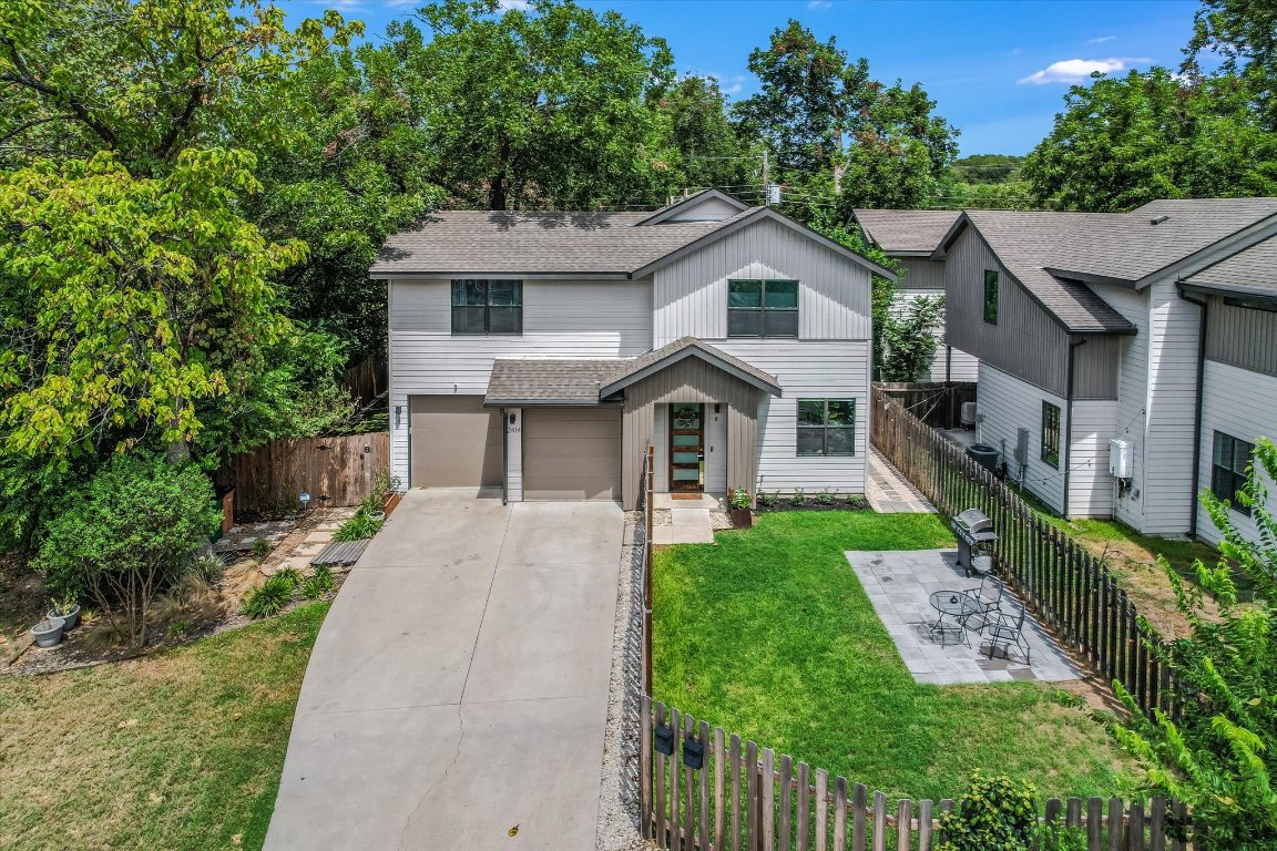 2414 East Martin Luther King Jr Boulevard, Unit A Austin, TX 78722 - Photo 25 of 32 a aerial view of a house with a yard and potted plants