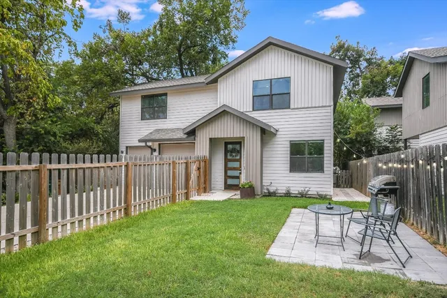 a view of a chair and table of the house